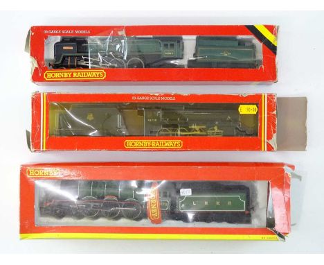 A group of HORNBY OO Gauge steam locomotives comprising Britannia, a class 8F and Flying Scotsman (R9098 Thomas the Tank Engi