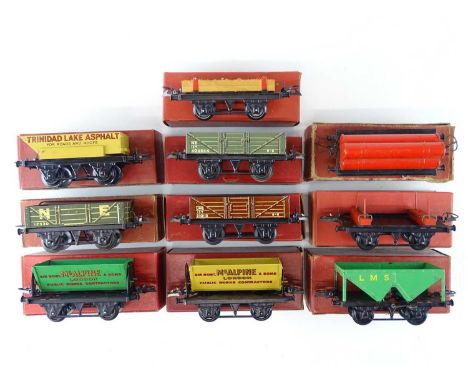 A group of HORNBY O Gauge mixed post war wagons to include tippers, hopper and open wagons - G/VG in G boxes (10)