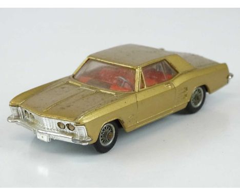 A CORGI 245 Buick Riviera in metallic gold with spoked hubs - G in G/VG box