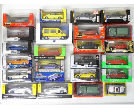 A quantity of 1:24 scale diecast vehicles by BBURAGO, WELLY, WHITEBOX, SCHABAK and others - G/VG in G/VG boxes (23)