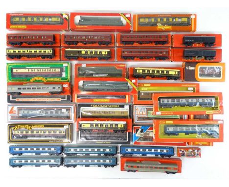 A large group of boxed and unboxed OO Gauge rolling stock by HORNBY, MAINLINE, LIMA and others - F/G in F/G boxes (38)