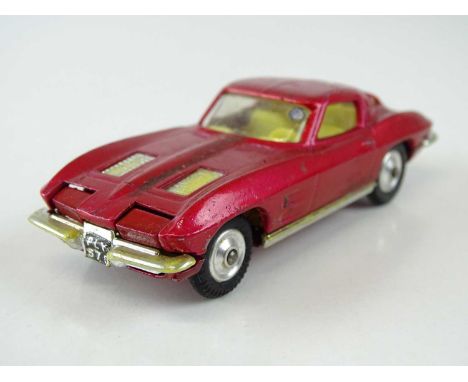 A CORGI 310 Chevrolet Corvette Stingray in cerise - F/G in G box