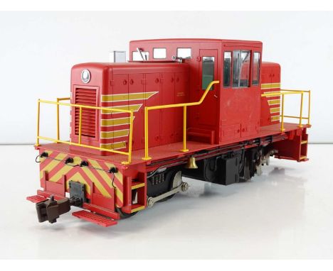 A SPECTRUM BY BACHMANN G scale GE 45-ton side rod diesel switcher locomotive in red/yellow stripe livery - VG unboxed