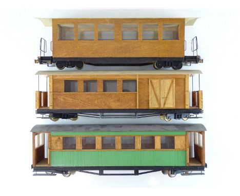 A group of scratchbuilt G scale narrow gauge (32mm) bogie coaches in wooden panel finish - G unboxed (3)