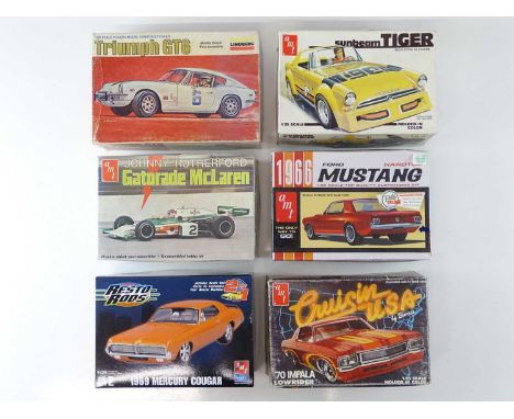 A group of 1:25 scale plastic car kits by AMT and LINDBERG contents unchecked but appear complete - G/VG in G boxes (6)