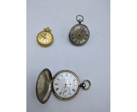 Two Sterling silver pocket watches, engine turned cases, together with a yellow metal pocket watch