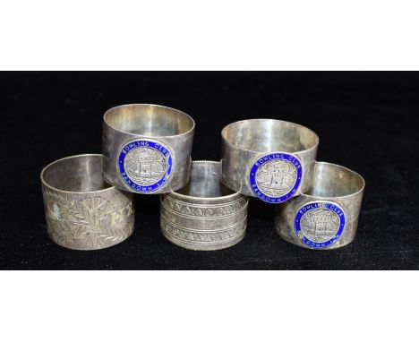 THREE SILVER NAPKIN RINGS each with blue enamelled Bowling Club disc, weighing a total of approx. 72 grams together with two 
