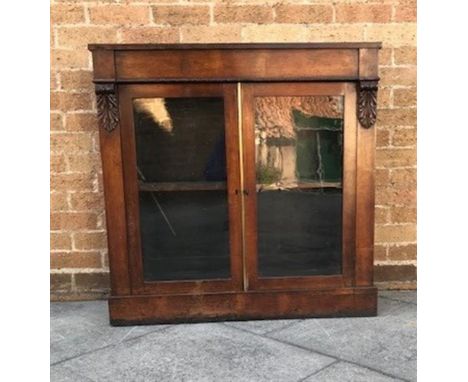 VICTORIAN MAHOGANY BOOKCASE, with the twin glazed doors opening to reveal a fitted shelf and raised on a plinth base, 92cm X 