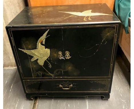 JAPANESE LACQUERED TABLE TOP CABINET, with twin cupboard doors opening to reveal a fitted shelf, above a frieze drawer, with 