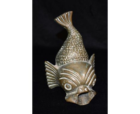 A BRONZE MODEL OF A STYLISED FISH, 20cm long Condition Report : no signs of damage. curious piece, no obvious clues to age, c