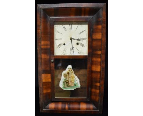 AN AMERICAN WALL CLOCK in rosewood case,  paper trade label for the Waterford Clock Co., Conneticut, 39cm wide 66cm high