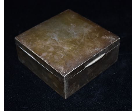 A SMALL SILVER CIGARETTE BOX The square plain box cedar lined with weighted base 9cms square Condition Report : some denting 