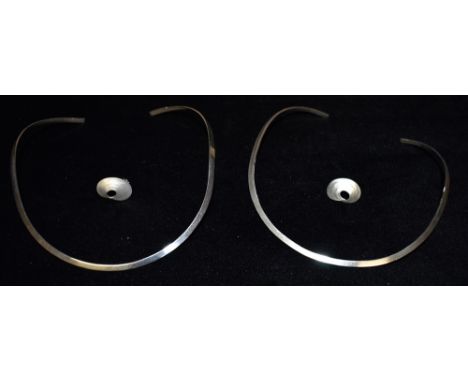 TWO SILVER TORQUE CHOKER NECKLACES And a pair of silver earrings Condition Report : Good, minor wear and tear only Condition 