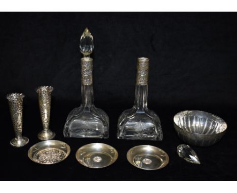 FIVE ITEMS OF SILVER Comprising a pair of large cut glass scent bottles with silvers collars, a pair of small bud vases with 