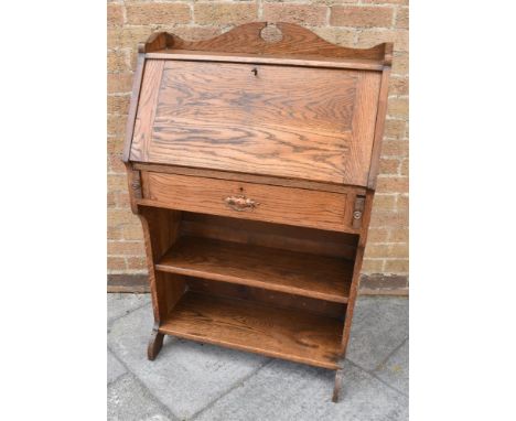 2OTH CENTURY OAK BUREAU, the fall front opening to reveal four vertical pigeon holes, flanked by two vertical pigeon holes ab