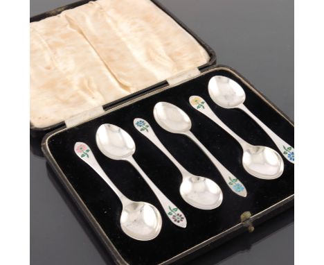 Bernard Cuzner (attributed) for Liberty and Co., a harlequin set of six Arts and Crafts silver and enamelled coffee spoons, W