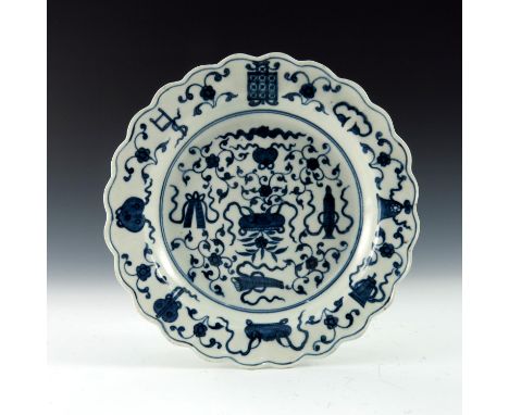 A Worcester blue and white plate, circa 1775, pseudo Chinese concentric ring and seven character mark, Hundred Antiques patte