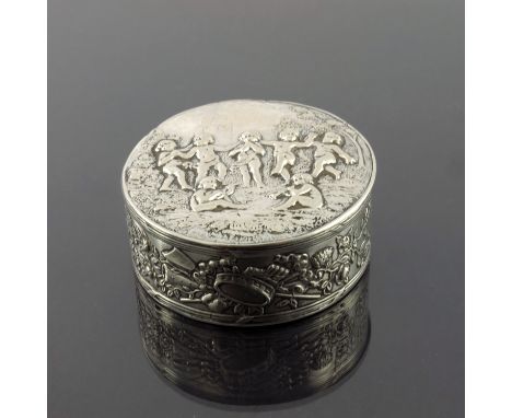 A 19th century German silver snuff box, circa 1890, circular form, embossed and chased with an allegorical Bacchanalian scene