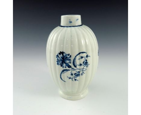 A Worcester blue and white tea caddy, circa 1765, W script mark, painted with the Gillyflower or Carnation pattern, reeded ov