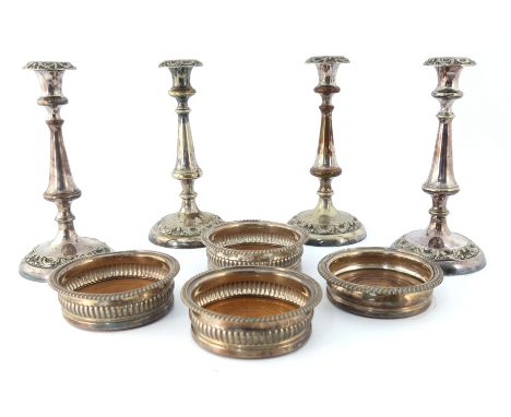 A set of three early 19th century old Sheffield plated wine coasters, unmarked, circa 1810-20, fluted circular form, gadroon 