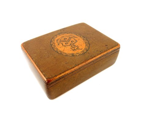 A 19th Century mauchline ware penwork table snuff box, diaper design with heraldry within an oak wreath to the cover, height 
