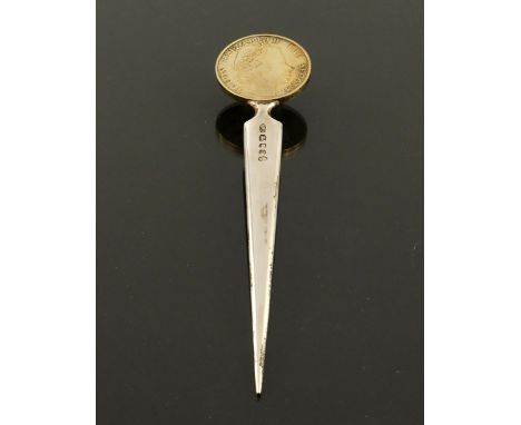 Stuart Devlin for the Royal Mint, a Modernist silver and parcel gilt commemorative letter opener, London 1977, the gilt coin 