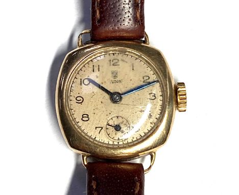 Tudor, a lady's 9ct gold wrist watch, manual wind movement, fitted to an unsigned brown leather strap with gold plated pin bu