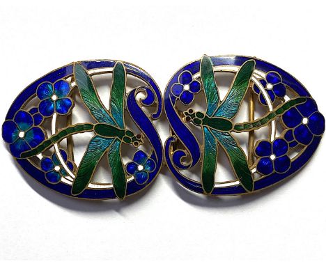 An Arts &amp; Crafts gilt metal and enamel buckle, reticulated in the form of two dragonflies and flowers, in heart-shape ten