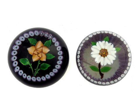 William Manson for Caithness, two limited edition floral glass paperweights, Royal Mint and Royal Flourish, each within cane 