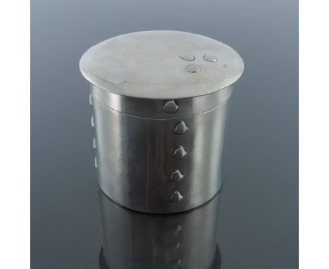 Archibald Knox for Liberty and Co., a Tudric pewter tea caddy, model 0104, cylindrical form, embossed with vertical bands of 