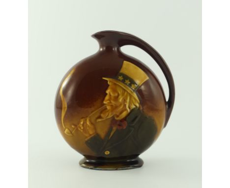 Royal Doulton Kingsware Uncle Sam jug, flattened spherical form, handle moulded into spout, marked "Deward's Scotch" on non-i