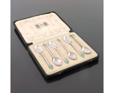 Liberty and Co., a set of six silver and enamelled coffee spoons, Birmingham 1921, cast fluted form with foliate terminals in