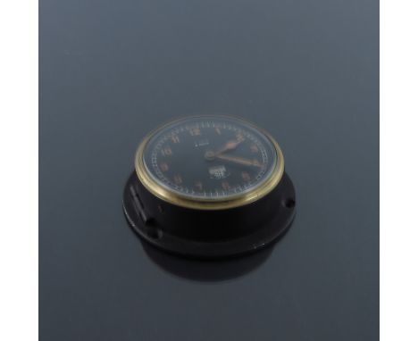 Motoring Interest, a Smiths 8 day vintage vehicle dashboard mounted timepiece, circular black enamelled case with brass bezel
