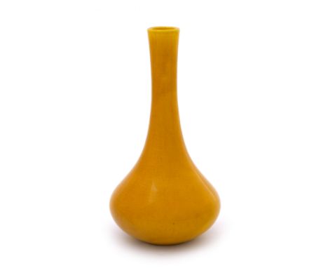 Burmantofts, a faience art pottery vase or lamp base, circa 1900, bulbous bottle form, monochrome orange glaze, original cent