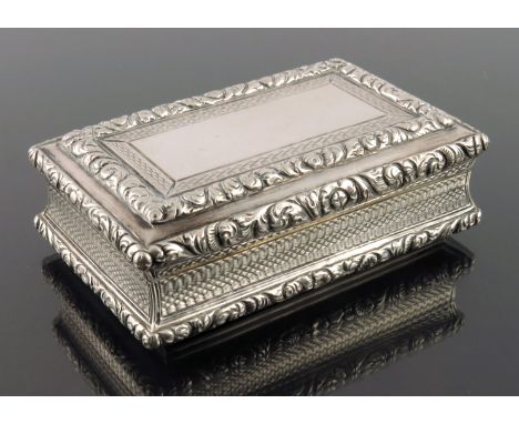 A George IV silver table snuff box, Nathaniel Mills, Birmingham 1825, cuboid form, cast and chased with borders of foliate sc