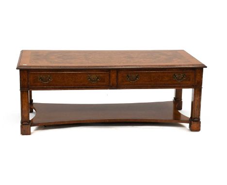 A Reproduction Burr Walnut Coffee Table, with two drawers opposed by dummies, the square section legs joined by a shaped shel