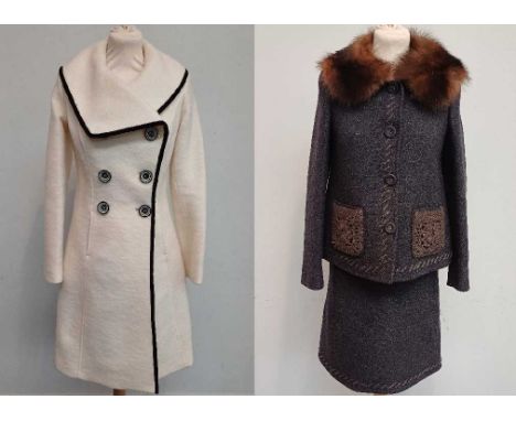 Prada Dark Grey Two Piece Wool Skirt Suit, comprising a slightly swing style jacket with long sleeves, fur mounted collar, bu