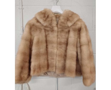 A Léon Vissot Paris Light Brown Mink Jacket with stylish collar, elbow length sleeves, silk lining, embroidered with the init