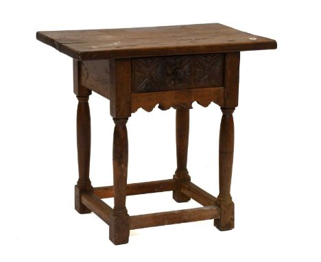 A Provincial Style Carved Oak Lamp Table, with single drawer, 65cm by 41cm by 61cm