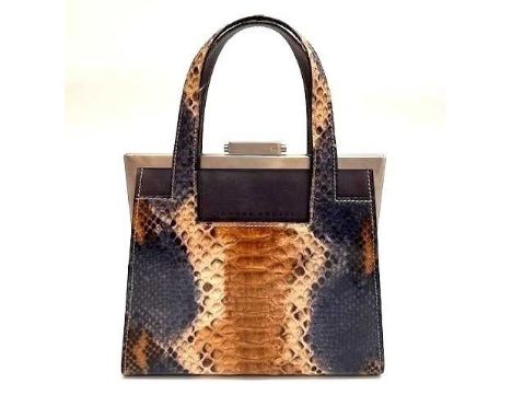 Tanner Krolle Navy Blue Leather Handbag with a python style mount, pewter toned hinged clasp closure, embossed brand name to 
