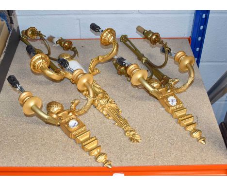 A Pair of Classical Style Modern Gilt Metal Twin-Light Wall Sconces, with pineapple finials and scrolling branches with eagle
