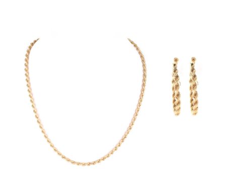 Vintage Italian 18 Karat Yellow Gold Rope Link Necklace together with Vintage 14 Karat Yellow Gold Rope Link Hoop Earrings. N