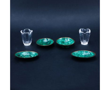 Six (6) Piece Assembled Smoking Set. Includes 4 brass mounted malachite ashtrays and 2 Steuben crystal urns. Crystal is signe