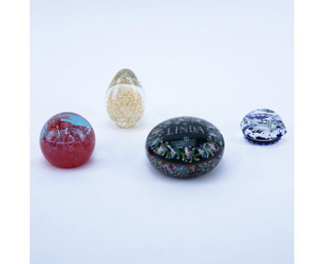 Lot of Four (4) Art Glass Paperweights. Includes Cartier, Baccarat, Caithness. Signed. Good condition on the 3 signed pieces.
