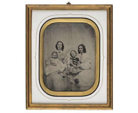 *Half-plate ambrotype of two women, early 1860s,  gilt highlights, 14.5 x 11cm, oval cream mat, gilt wood and plaster frame, 