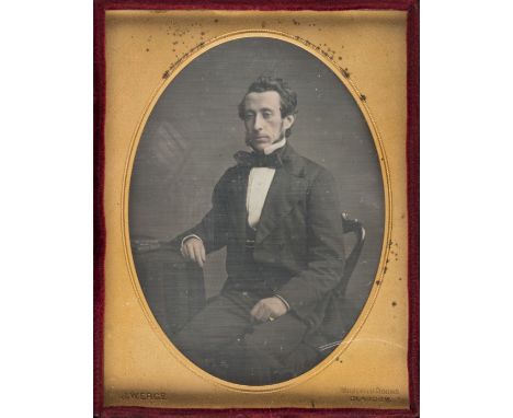 *Pair of quarter-plate daguerreotypes of a seated man, both 1850s,  the first by Thomas Jones of a younger man, tinted pink c