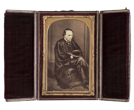 *Carte-de-visite-size ambrotype of a man and his seated wife, by an unknown photographer, 1860s,  in half case, together with