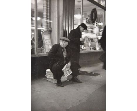 *Cartier-Bresson (Henri, 1908-2004). The American Scene, 1948,  vintage gelatin silver print of a newspaper vendor on a sidew
