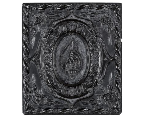 *Shell. Rare sixth-plate black thermoplastic union case by Samuel Peck & Co., before 1857,  housing an ambrotype portrait of 