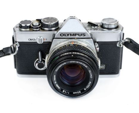 *Olympus and Carl Zeiss Jena Cameras. Collection of vintage SLR 35mm film cameras and lenses, including Olympus OM-2n camera 